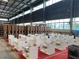 Assembled bathroom cabinets in a factory staging area
