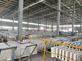 Rows of bathroom cabinets in a large factory