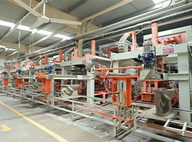Toilet units being processed on an automated production line