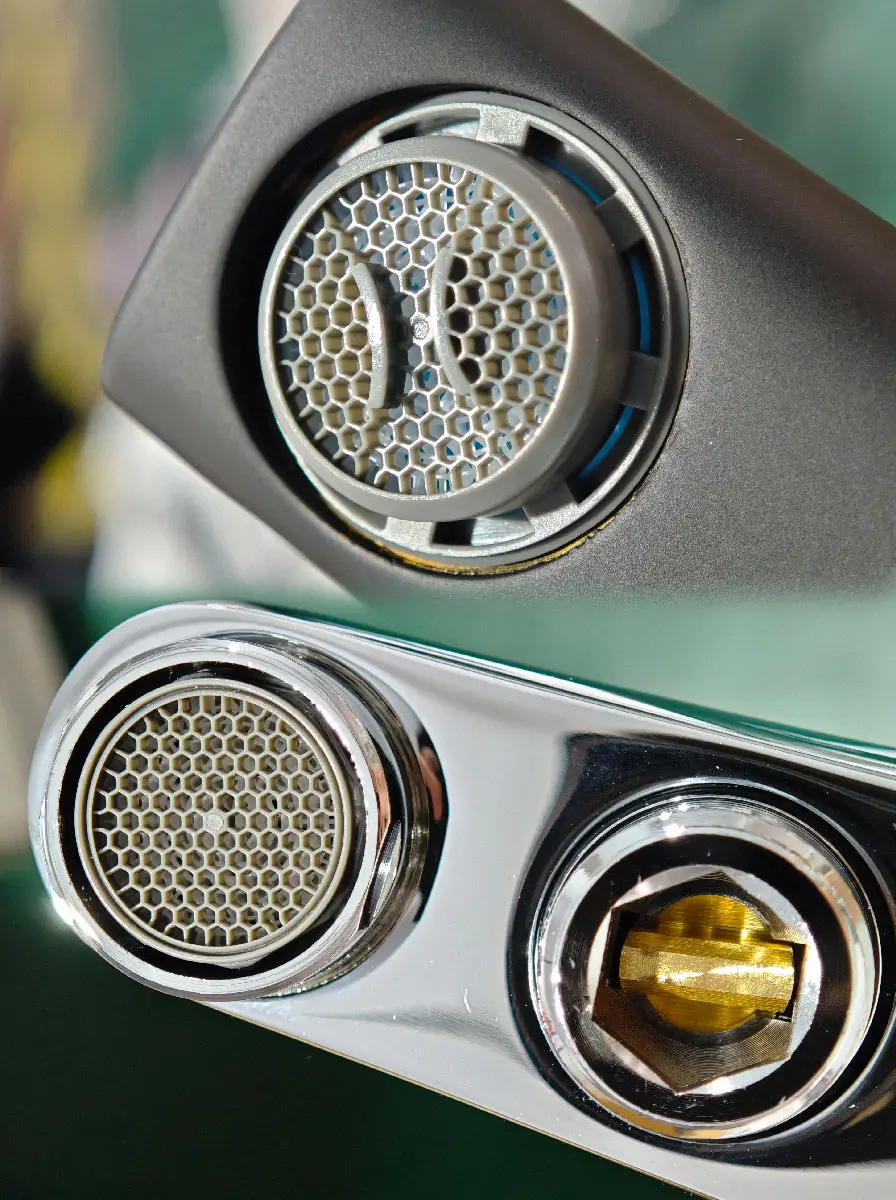 Faucet anatomy aerator close-up showing stainless steel mesh