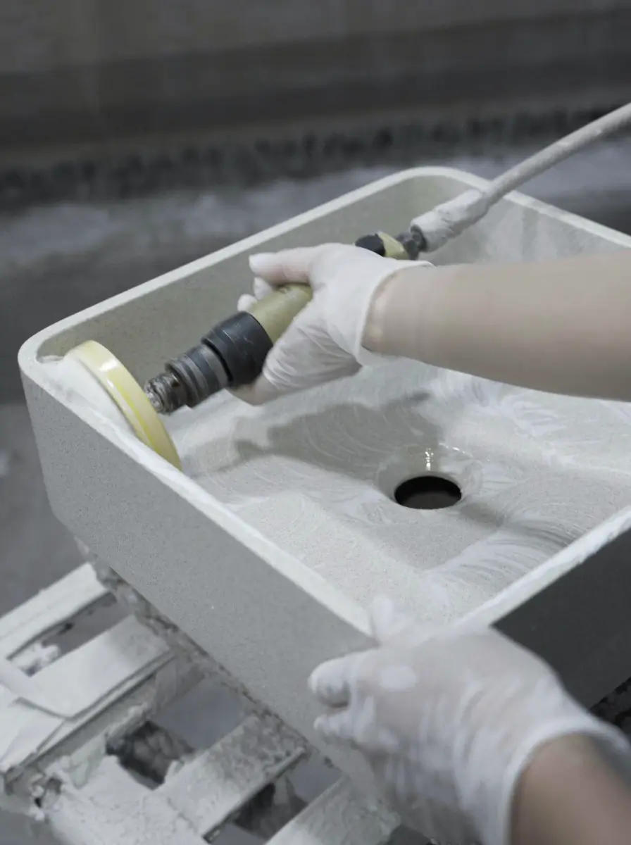 Spray-applied protective sealer during concrete basin manufacturing